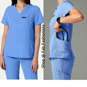 Jaanuu Magna 3-Pocket Scrub Top Ceil Blue S